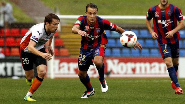 Double trouble: Newcastle's Adam Taggart bagged a brace for the Jets against the Roar.