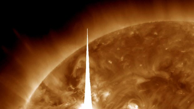 A handout image provided by NASA shows the massive solar flare erupt from the Sun.