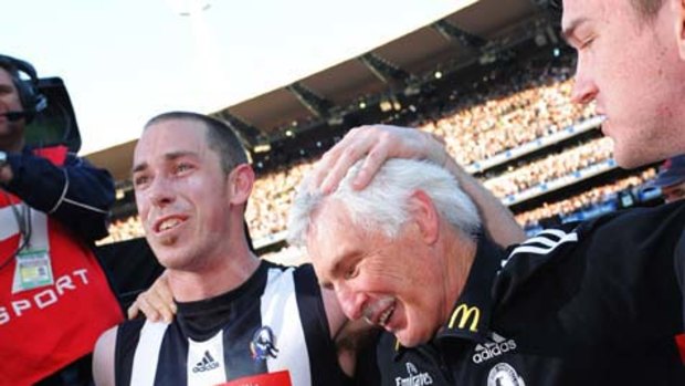 Captain and coach: Nick Maxwell and Mick Malthouse celebrate.