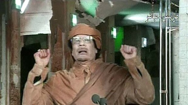 "I will die a martyr" ... Muammar Gaddafi  delivers a tirade against anti-government protesters on state television.