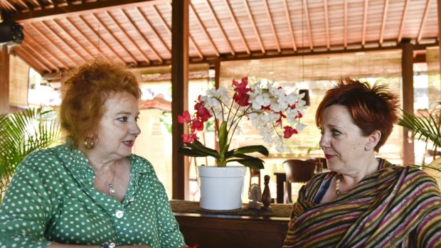 "We were so lucky to find a place to stay," says Coburg real estate agent Jackie Knapsey, right. She is stuck in Bali with her two children. They are among several Australians staying at Bali's Lily Lane Villas, owned by Jillian Wright, left. 