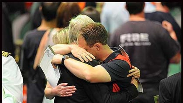 Mourners at the Rod Laver arena today.