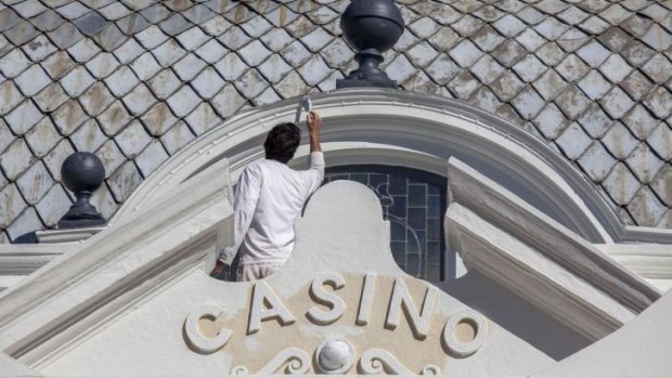 Finishing touches: Staff decorate the hotel during its refurbishment.