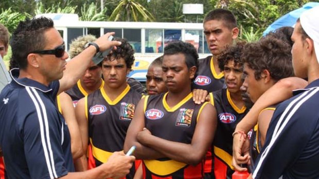 Former AFL champion Andrew McLeod has found satisfaction coaching young indigenous footballers.