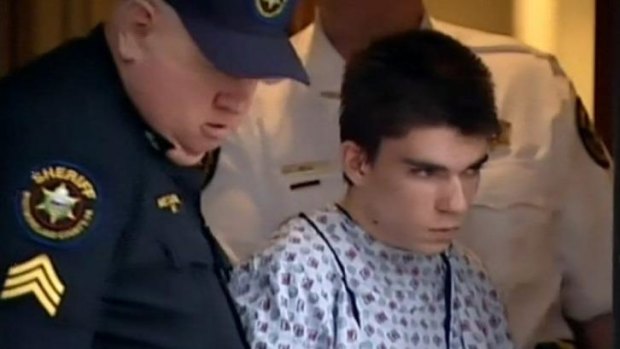 Stabbing suspect Alex Hribal, dressed in a hospital gown, pictured after his arraignment.