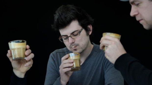 The daily grind &#8230; coffee judges Craig Simon and Rob Stewart mull their coffees.