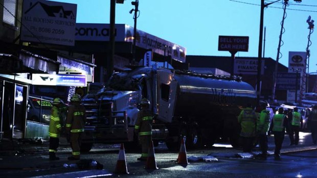 Fatal accident: a milk tanker crashed into a shopfront in Croydon, closing Parramatta Road in both directions.
