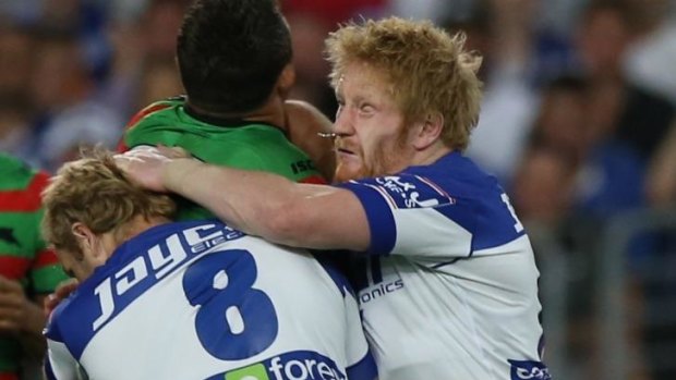 Point of impact: Sam Burgess' face meets James Graham's head.