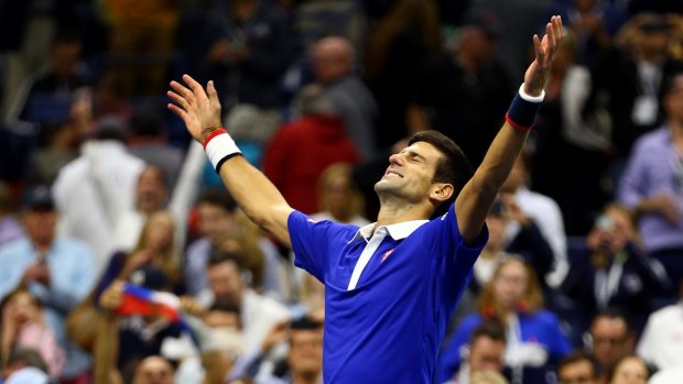 Victory: Novak Djokovic celebrates after winning the US Open.