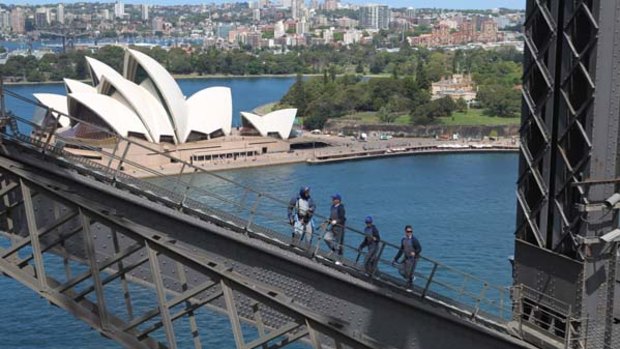 The only way is up ... Sydney FC coach Vitezslav Lavicka dislikes heights but yesterday he kept his promise to  mark his bottom-of-the-table team's first victory of the year - against Perth last weekend - with a climb on the Harbour Bridge.