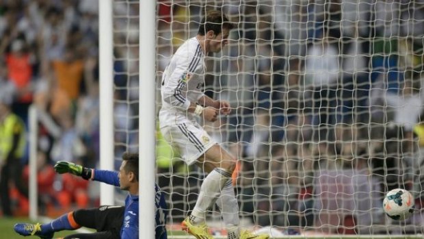 Gareth Bale fetches the ball after Ronaldo's stunner.