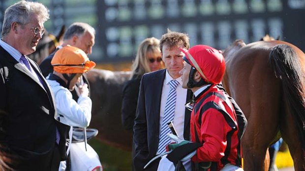 Trainer Anthony Cummings talks to jockey Brett Prebble after Smart Missile failed to place in the group 1 Sir Rupert Clarke Stakes.