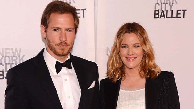Parents again... Drew Barrymore and Will Kopelman.