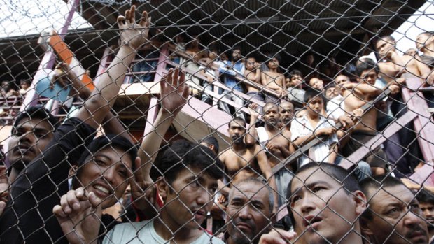 Asylum seekers at a detention centre in Malaysia, where the government is set to sign a refugee swap deal with Australia.