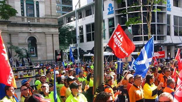 Protesting construction workers gather in Brisbane's CBD.