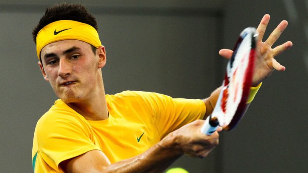 Bernard Tomic plays a forehand during his win over South Korea's Na Jung-Woong at Pat Rafter Arena.