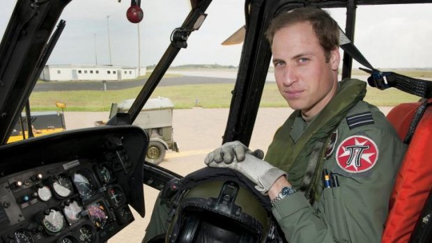 Britain's Prince William, second-in-line to the throne, is to start work as an air ambulance helicopter pilot next year. In this file photo, William sits in the cockpit of a helicopter at RAF Valley in Anglesey, Wales.