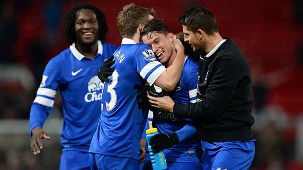 Everton's Bryan Oviedo (2nd R) celebrates with teammates after their English Premier League soccer match against Manchester United at Old Trafford.