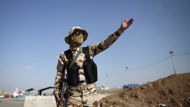 Pershmerga military at a Kurdish check point on June 14, 2014. 