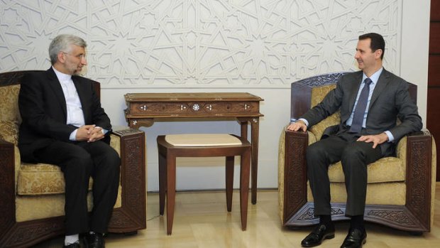 Allies ... Syrian President Bashar al-Assad, right, meets Saeed Jalili.