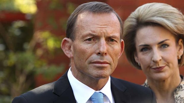 The carbon tax has a "devastating" impact ... Opposition Leader Tony Abbott and Senator Michaelia Cash.