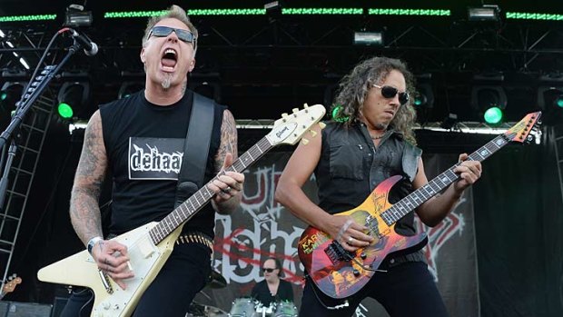 James Hetfield, Lars Ulrich and Kirk Hammett of Metallica perform a surprise set as Dehaan.
