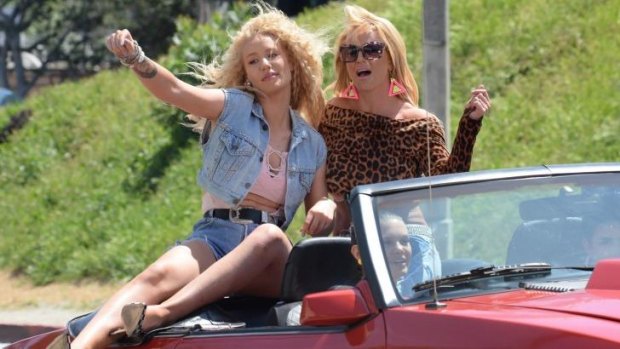 Iggy Azalea and Britney Spears on the set of their music video in Los Angeles last month.
