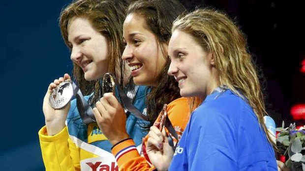 Campbell (L) with her silver medal in the 50m freestyle alongside gold medal winner Ranomi Kromowidjojo of the Netherlands and bronze medal winner Francesca Halsall of Great Britain.