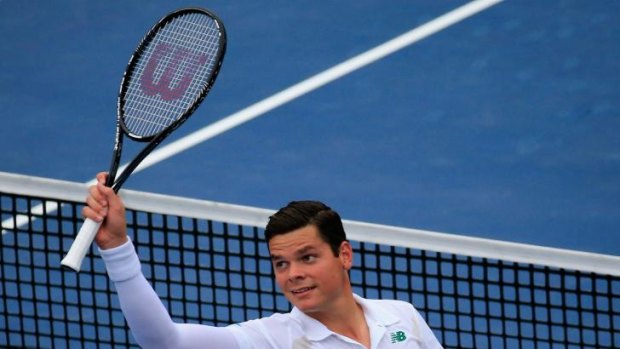 Milos Raonic celebrates a victory during the Citi Open.