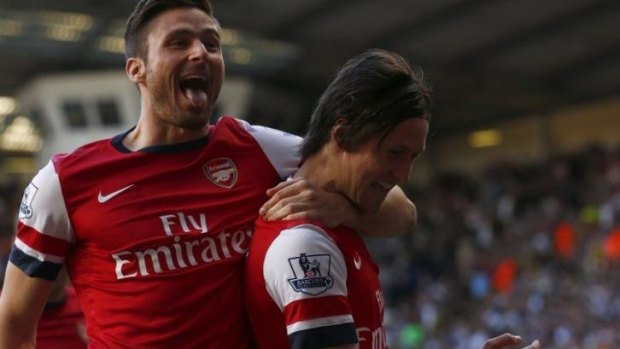 Rosicky (R) celebrates his goal with Olivier Giroud.