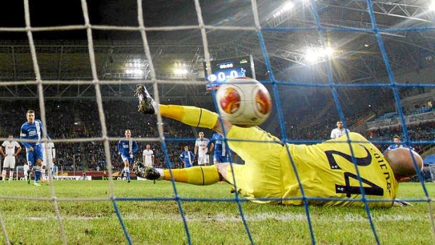 Winner: Yevhen Konoplyanka of Dnipro scores a controversial penalty past Tottenham's goalkeeper Brad Friedel.