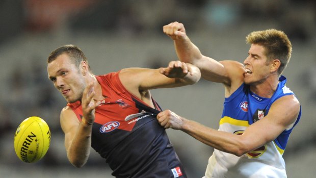 AFL.Round 7. Melbourne v Gold Coast Suns. Melbourne's Max Gawn battles with Sun's Zac Smith at the MCG.12th May 2013.Picture Sebastian Costanzo. The Age.