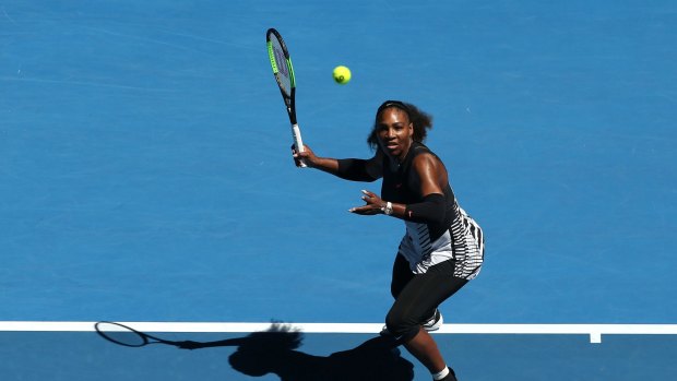 Long history: Serena Williams plays a forehand on her way to beating Nicole Gibbs.