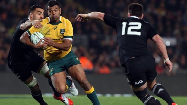 Going nowhere: Kurtley Beale is closed down by Liam Messam and Ryan Crotty.