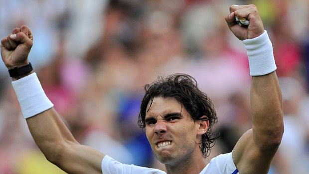 Rafael Nadal celebrates after beating Argentina's Juan Martin Del Potro to enter the quarter-finals.