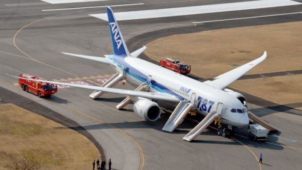 An All Nippon Airways (ANA) Boeing 787 Dreamliner is seen after making an emergency landing at Takamatsu airport in  western Japan January 16, 2013. The plane landed after after smoke appeared in the plane's cockpit, but all 137 passengers and crew members were evacuated safely.