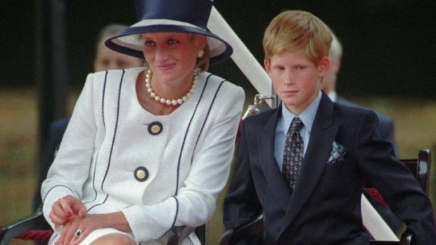 Princess Diana and Prince Harry in 1995: A biography of Diana's younger son claims she was a manipulative, paranoid mother.