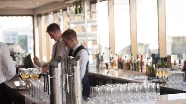 The elegant new penthouse premises features a well-stocked bar.