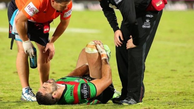 Greg Inglis suffers a high ankle sprain in South Sydney's win over the Warriors in Perth.