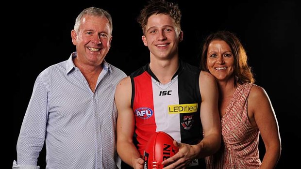 Jack Billings with his father Graeme and mother Letitia after being drafted to St Kilda.