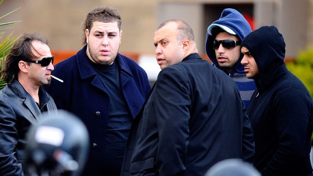 Omar Chaouk, second from left, at the funeral of his father in 2010.
