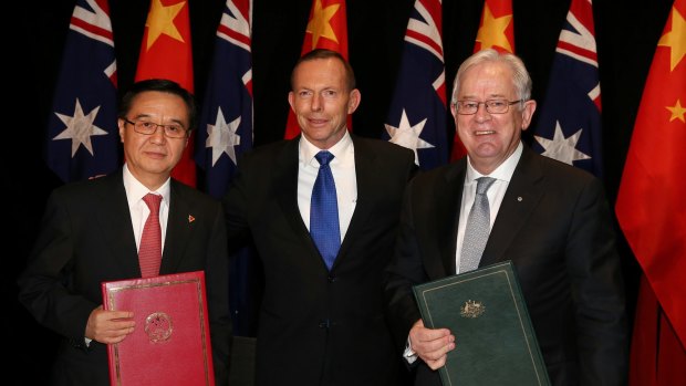 Andrew Robb with Dr Gao Hucheng, China's Minister of Commerce, and former prime minister Tony Abbott.