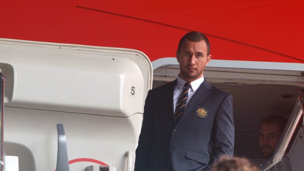 Familar faces ... Quade Cooper at Sydney Airport, where the 30-member Wallabies side for the World Cup was announced.