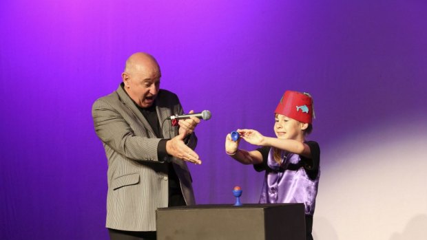Trickery: Bruce Glen, left, brings magic into the lives of young people.
