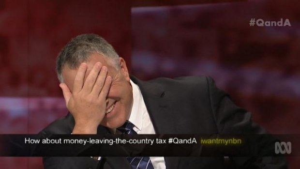 'Duh' ... Australian Treasurer Joe Hockey laughs during <i>Q&A</i>'s show on intergenerational wealth and health.