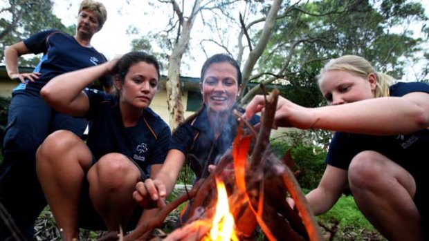 Much more than camping … from left, Kristy McKie, Rachel Fife and Lauren Hansen, who are Ku-ring-gai guides. The movement is celebrating its 100th anniversary.