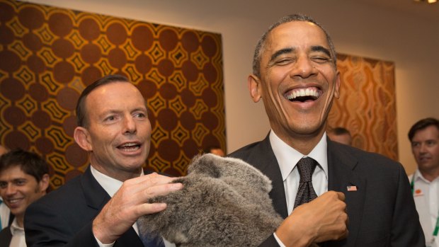 US President Barack Obama laughs as holds a koala while Tony Abbott looks on during a photo opportunity on the sidelines of the G-20 summit in Brisbane in November.