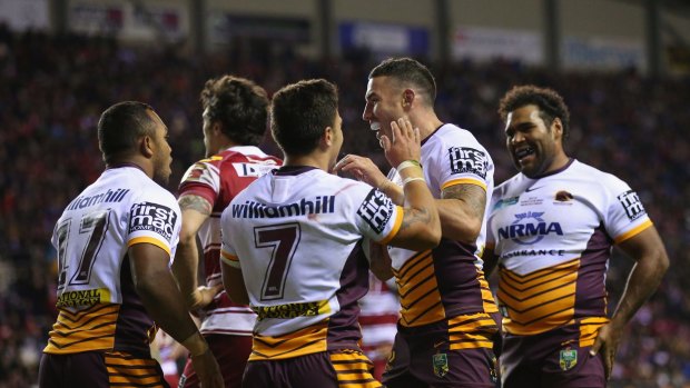 Thumping: Brisbane Broncos celebrate during their World Club Championship win over the Wigan Warriors at DW Stadium.