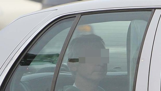Australian collar bomb hoax suspect Paul Douglas Peters pictured after leaving a courthouse in Kentucky.