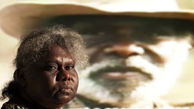 Warned about the wrath of Djang... Yvonne Margarula, one of the traditional owners from the Mirarr people, in front of an image of her father.